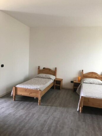 Imagen de la habitación del Cascina Monte Diviso. Foto 21