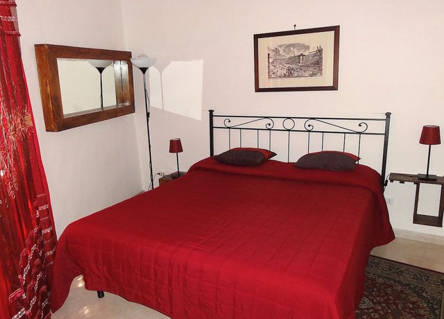 Imagen de la habitación del Case Vacanze Cedro 21. Foto 15