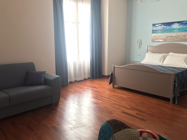 Imagen de la habitación del Case Vacanze al Duomo. Foto 11