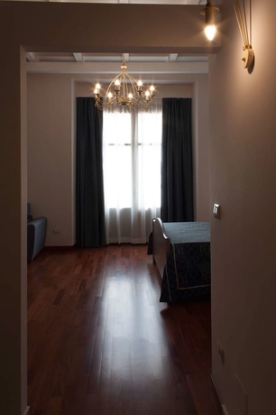 Imagen de la habitación del Case Vacanze al Duomo. Foto 12