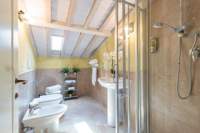 Imagen de la habitación del Casolare Dei Colli in Camaiore. Foto 5