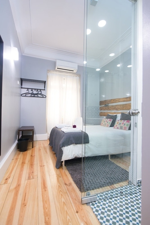 Imagen de la habitación del Castilho Lisbon Suites. Foto 9