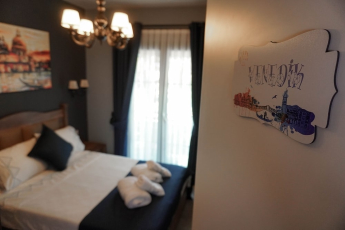 Imagen de la habitación del Cati Hotel Boutique Plus. Foto 11