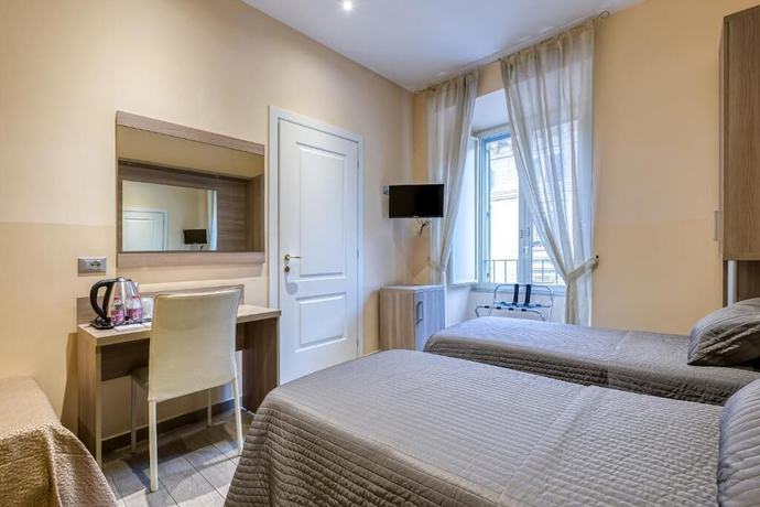 Imagen de la habitación del Catone Vatican Suites. Foto 7