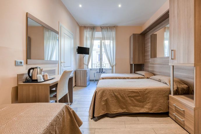 Imagen de la habitación del Catone Vatican Suites. Foto 18