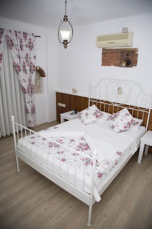 Imagen de la habitación del Cayirli Alacati Butik Otel. Foto 19