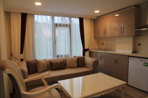 Imagen de la habitación del Caykent Suites Deluxe Hotel. Foto 1