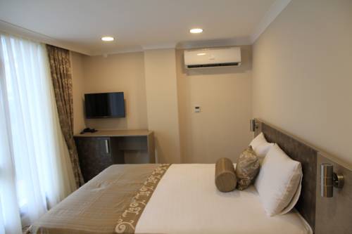 Imagen de la habitación del Caykent Suites Deluxe Hotel. Foto 4