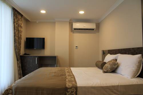 Imagen de la habitación del Caykent Suites Deluxe Hotel. Foto 6