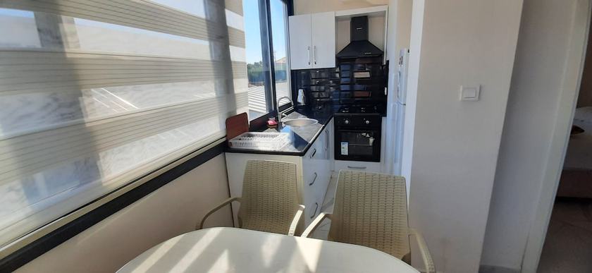 Imagen de la habitación del &Ccedil;eşme holiday homes. Foto 10