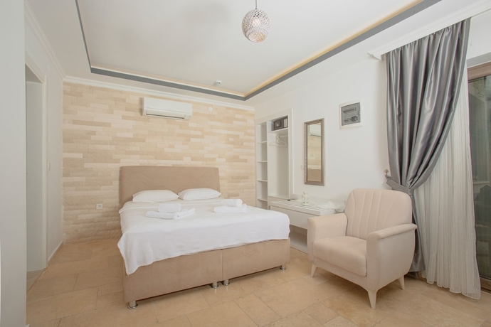 Imagen de la habitación del Cedrus Suites. Foto 7