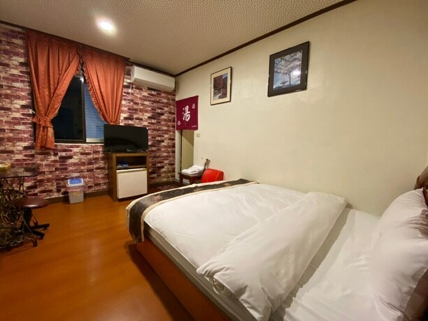 Imagen de la habitación del Celebrity Hotspring Hotel. Foto 6