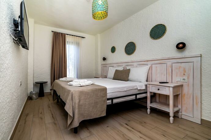 Imagen de la habitación del Cemal Alacati Butik Hotel. Foto 15