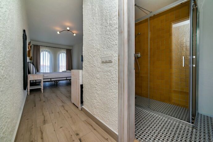 Imagen de la habitación del Cemal Alacati Butik Hotel. Foto 17