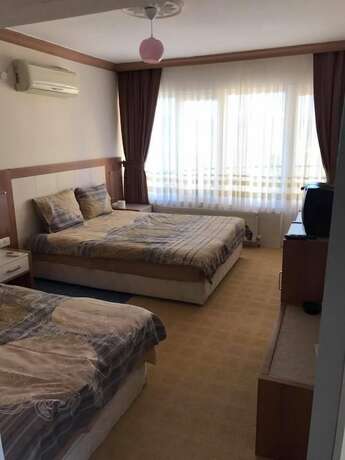 Imagen de la habitación del Cendik Motel. Foto 11