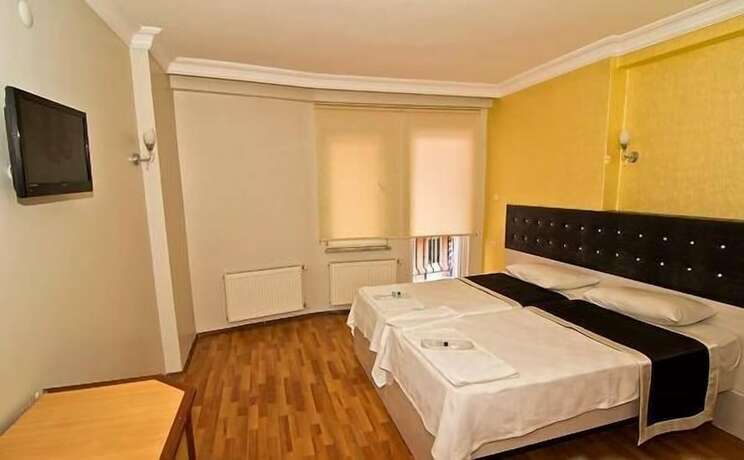 Imagen de la habitación del Cenova Otel. Foto 10