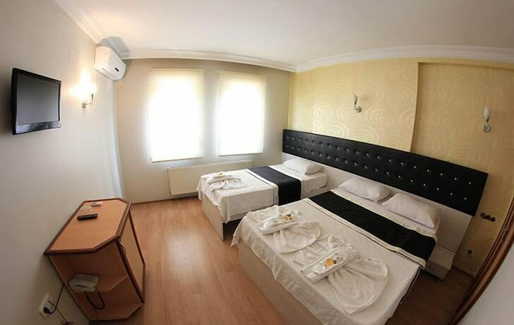 Imagen de la habitación del Cenova Otel. Foto 11