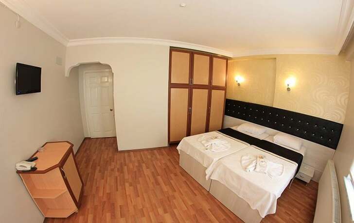 Imagen de la habitación del Cenova Otel. Foto 12