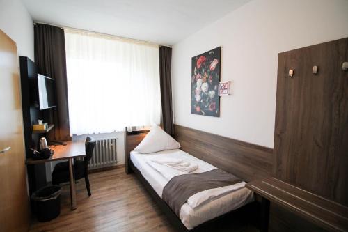 Imagen de la habitación del Center Hotel. Foto 5