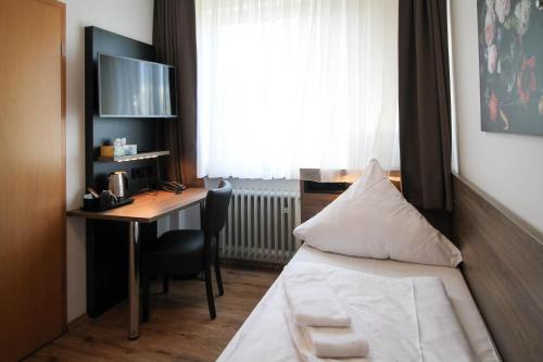 Imagen de la habitación del Center Hotel. Foto 12