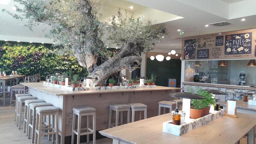 Imagen del bar/restaurante del Center Parcs Villages Nature Paris. Foto 1