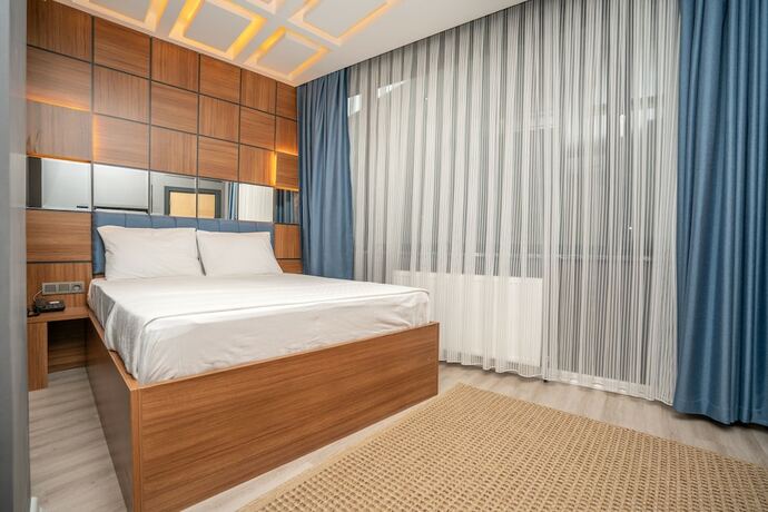 Imagen de la habitación del Center Suite. Foto 19