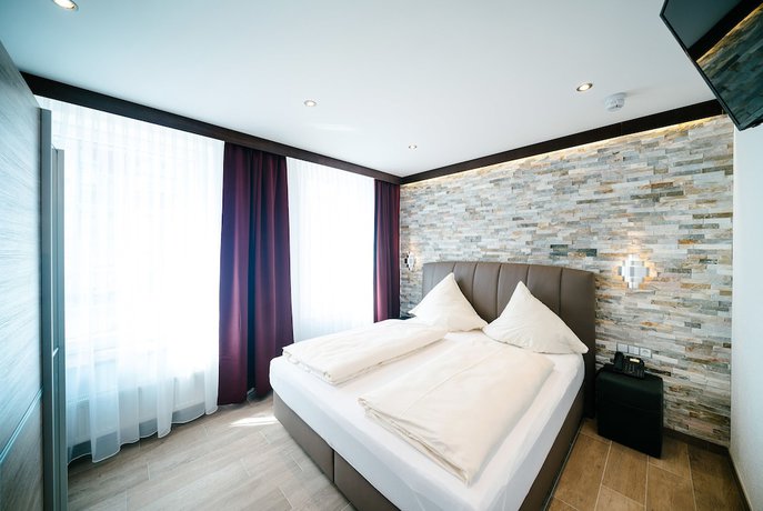 Imagen de la habitación del Central City Hotel. Foto 13