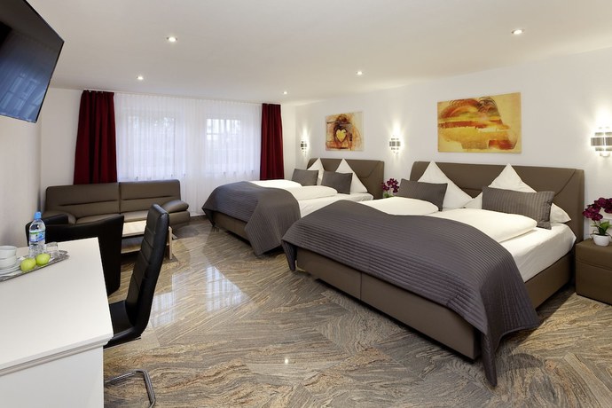 Imagen de la habitación del Central City Hotel. Foto 17