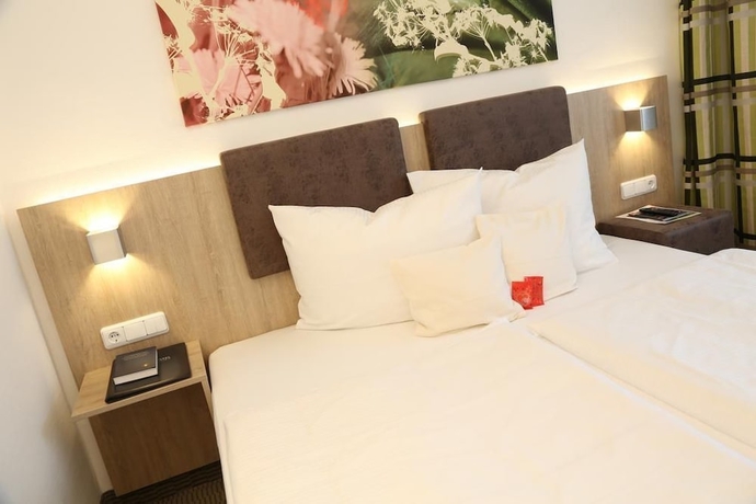 Imagen de la habitación del Central Hotel Eschborn. Foto 8