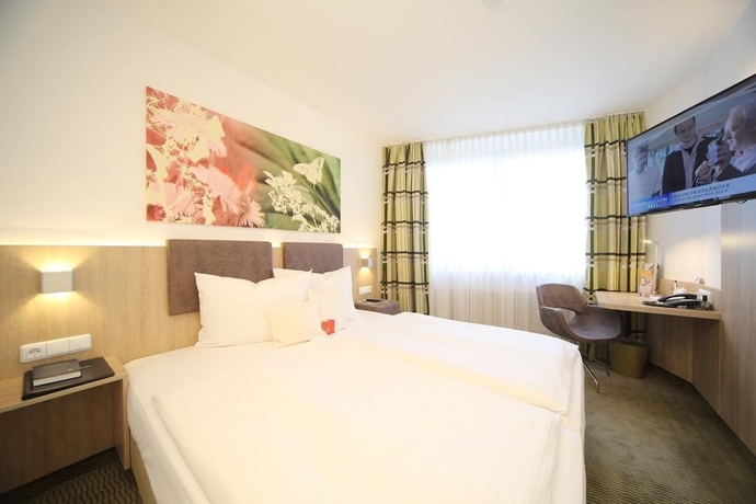 Imagen de la habitación del Central Hotel Eschborn. Foto 9