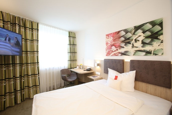 Imagen de la habitación del Central Hotel Eschborn. Foto 12