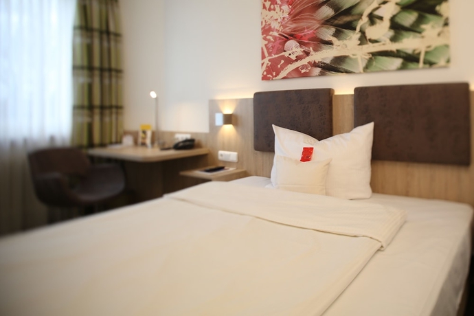 Imagen de la habitación del Central Hotel Eschborn. Foto 13