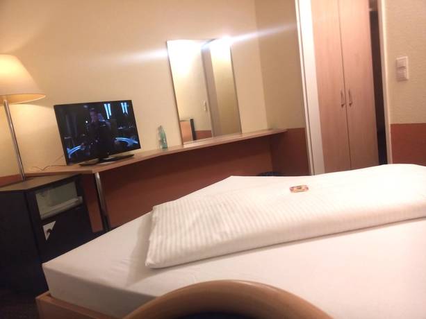 Imagen de la habitación del Central Hotel. Foto 14