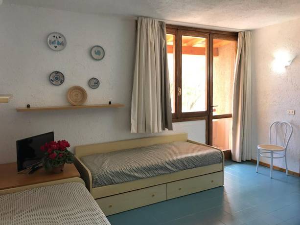 Imagen de la habitación del Centro Vacanze Cugnana Verde. Foto 7