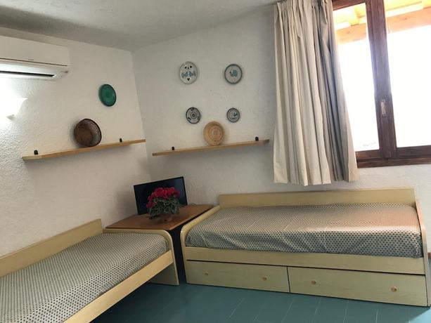 Imagen de la habitación del Centro Vacanze Cugnana Verde. Foto 9