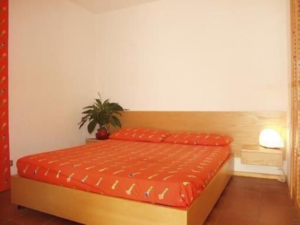 Imagen de la habitación del Centro Vacanze Cugnana Verde. Foto 13