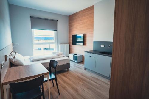 Imagen de la habitación del Centrum Szkoleniowo - Noclegowe HHM HEGELMANN. Foto 14