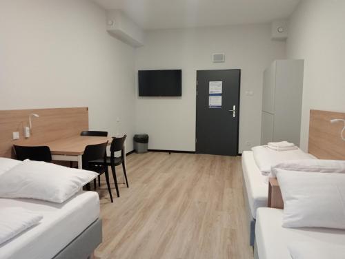 Imagen de la habitación del Centrum Szkoleniowo - Noclegowe HHM HEGELMANN. Foto 19