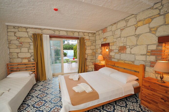 Imagen de la habitación del Cesme Elysium Hotel. Foto 17