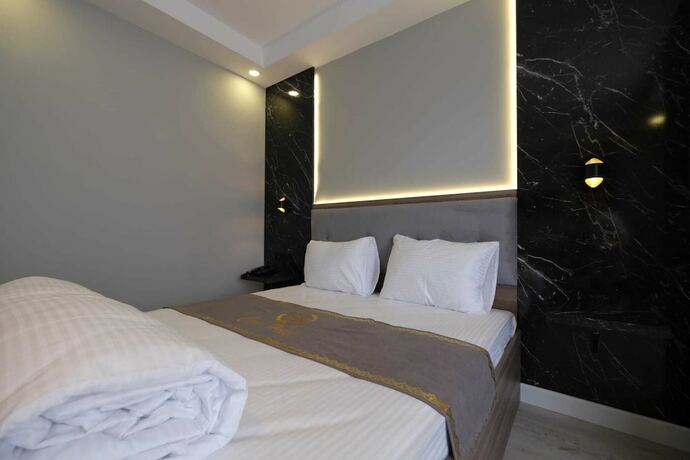 Imagen de la habitación del Cevvo Hotel. Foto 17