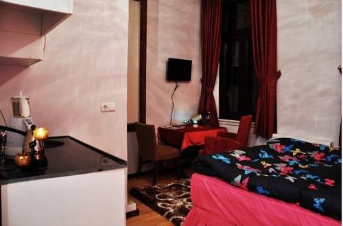 Imagen de la habitación del Cezayir Suites. Foto 40