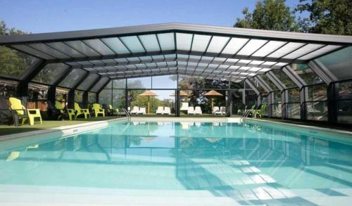 Imagen de la habitación del Chalet 3 étoiles - Piscine - eeccaa. Foto 20