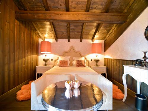 Imagen de la habitación del Chalet Hotel Le Castel. Foto 12