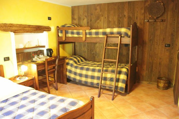Imagen de la habitación del Chambres d'Hotes Les Fleurs. Foto 4