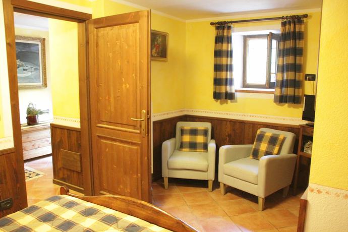 Imagen de la habitación del Chambres d'Hotes Les Fleurs. Foto 9