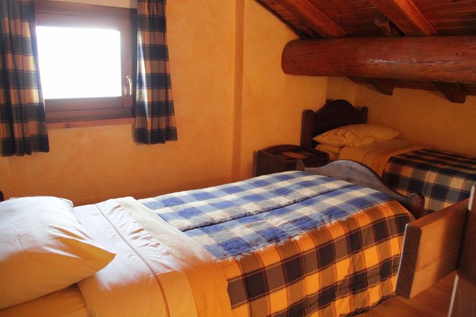 Imagen de la habitación del Chambres d'Hotes Les Fleurs. Foto 14