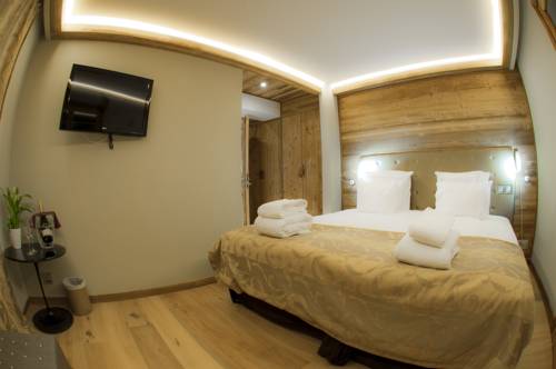 Imagen de la habitación del Chamois D'or Hotel. Foto 8