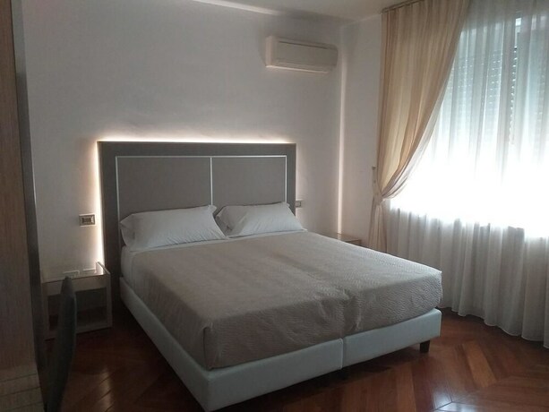 Imagen de la habitación del Champagne Rooms. Foto 21