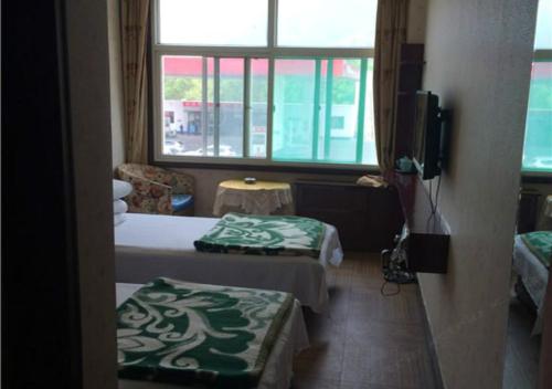 Imagen de la habitación del Chaosheng Hotel. Foto 6