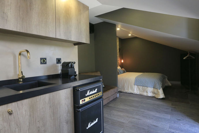 Imagen de la habitación del Charm Flats. Foto 3